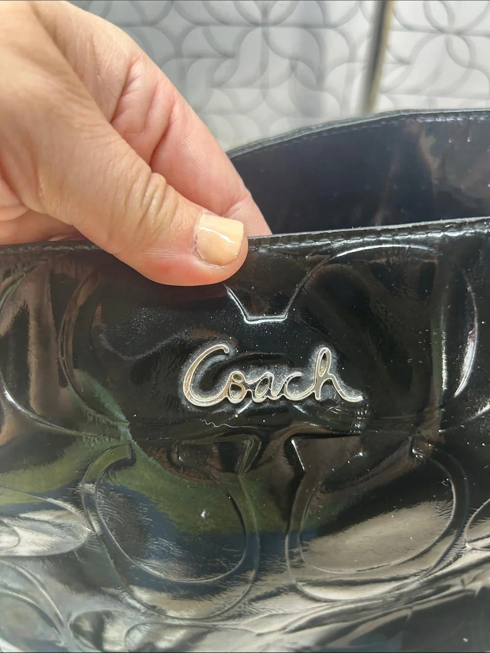 Coach black patent leather zip top tote bag